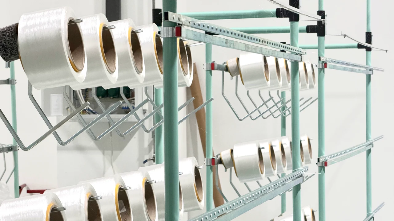 Yarn material for knitted fabrics