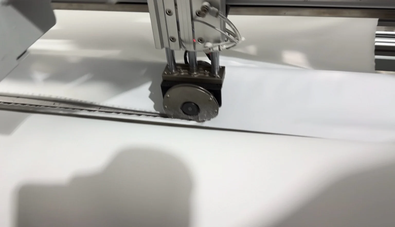 Fabric cutting and roll formation equipment