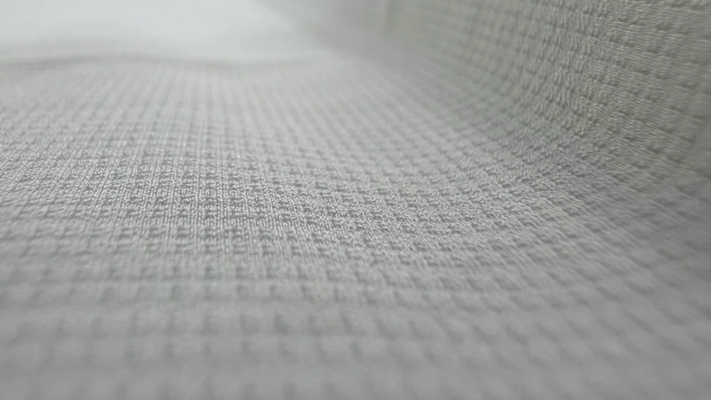 Stretch Double-Knit Eyelet Fabric macro knit texture