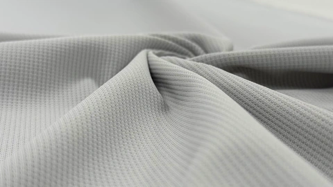 Matte Double-Knit Needle Mesh Fabric folded fabric cover thumbnail